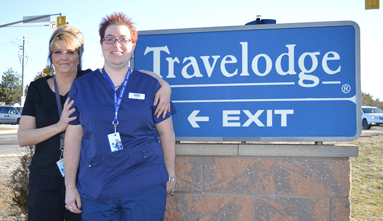 Community Support Services | Two ladies working at the Travelodge | Simcoe Community Services