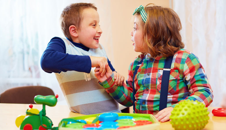 children shaking hands