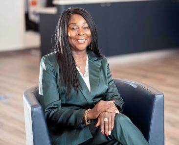 Business leader sitting in chair