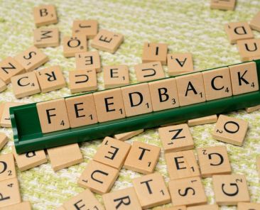 scrabble letters showing the word 'feedback'