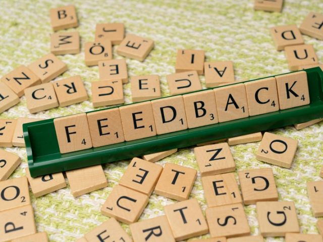 scrabble letters showing the word 'feedback'