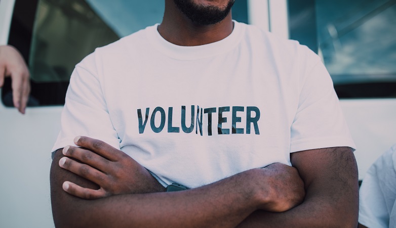 man wearing volunteer tshirt